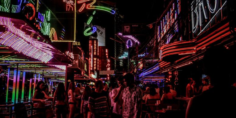 A Group Of People In A Bar