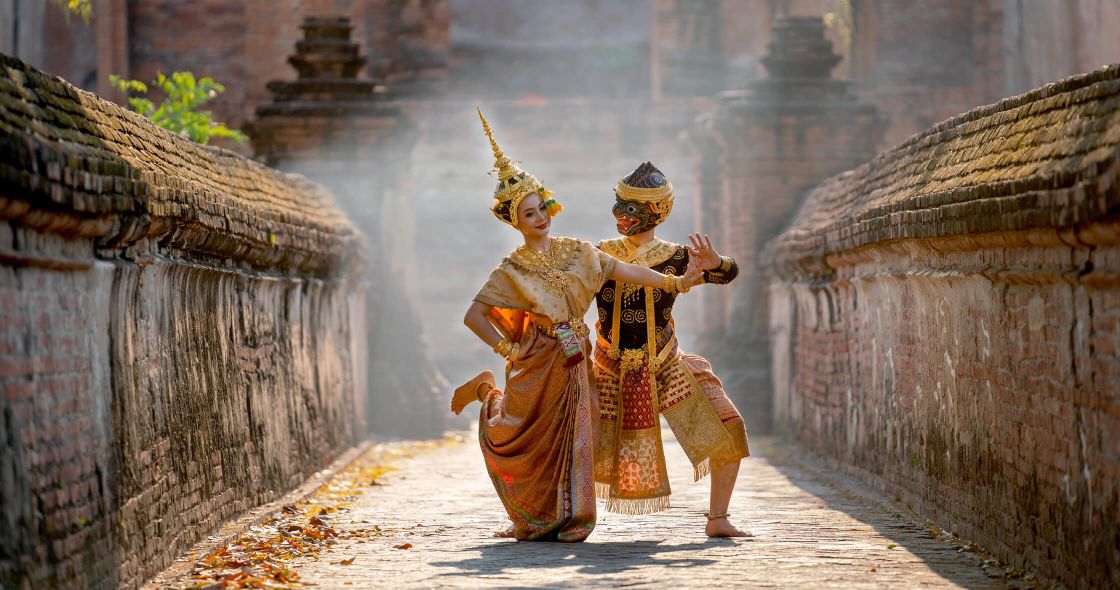 A Couple Of Women Wearing Traditional Clothing