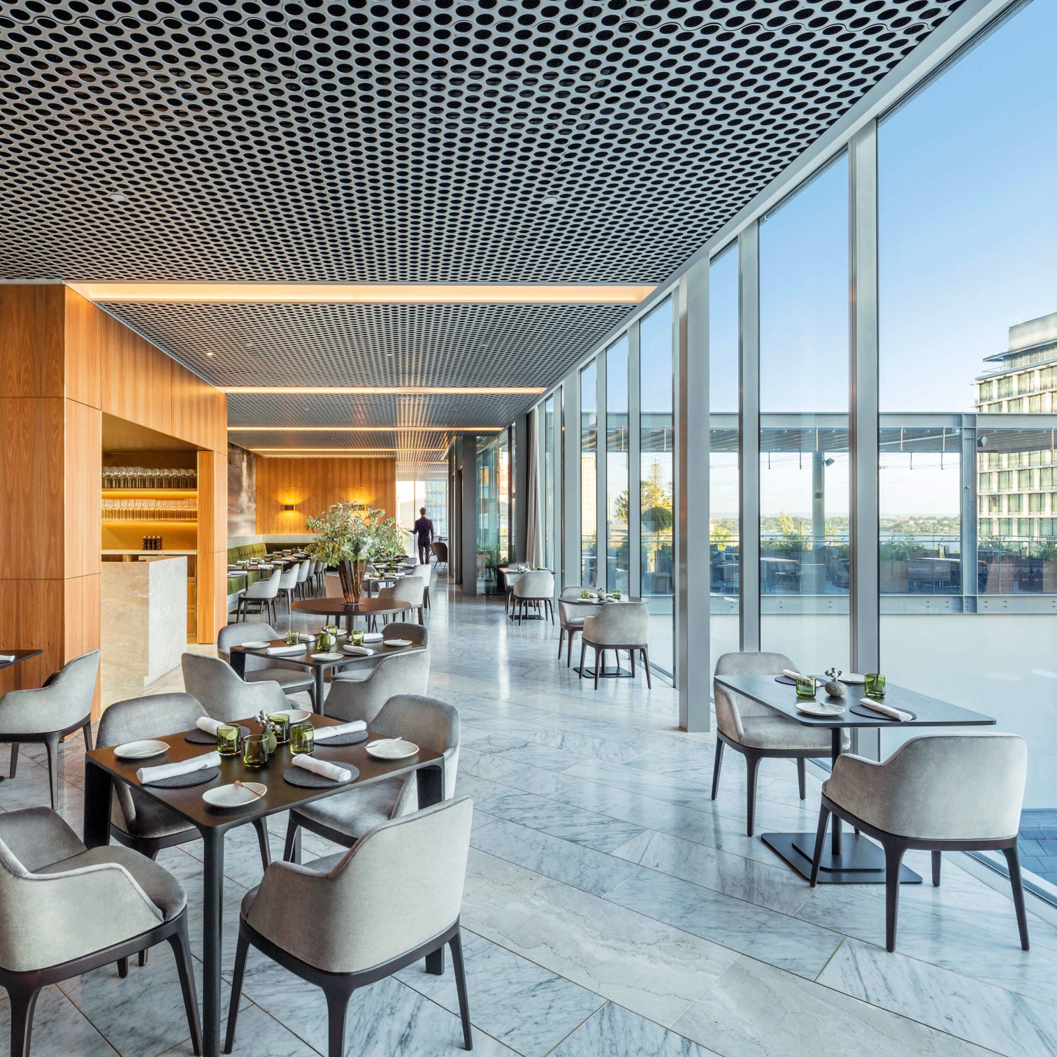 A Room With Tables And Chairs