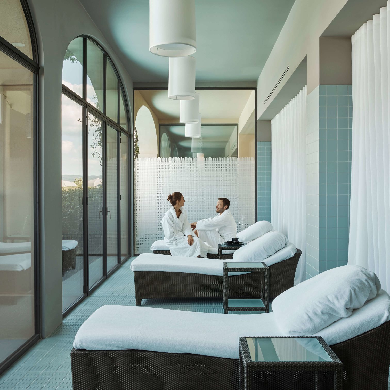 A Couple Of Men Working In An Office