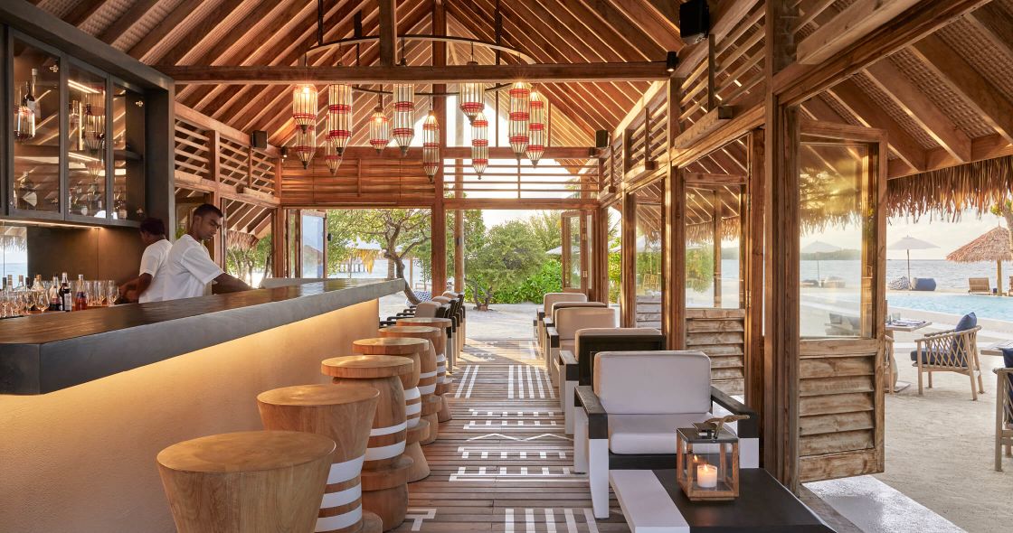 A Person Sitting At A Bar