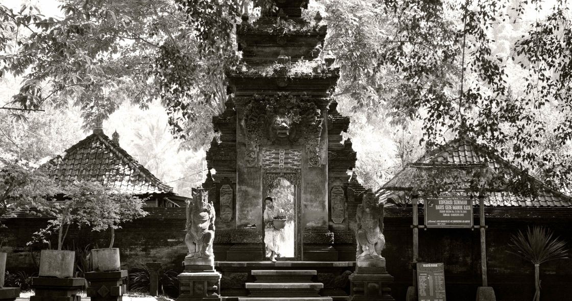 A Building With A Statue In Front Of It