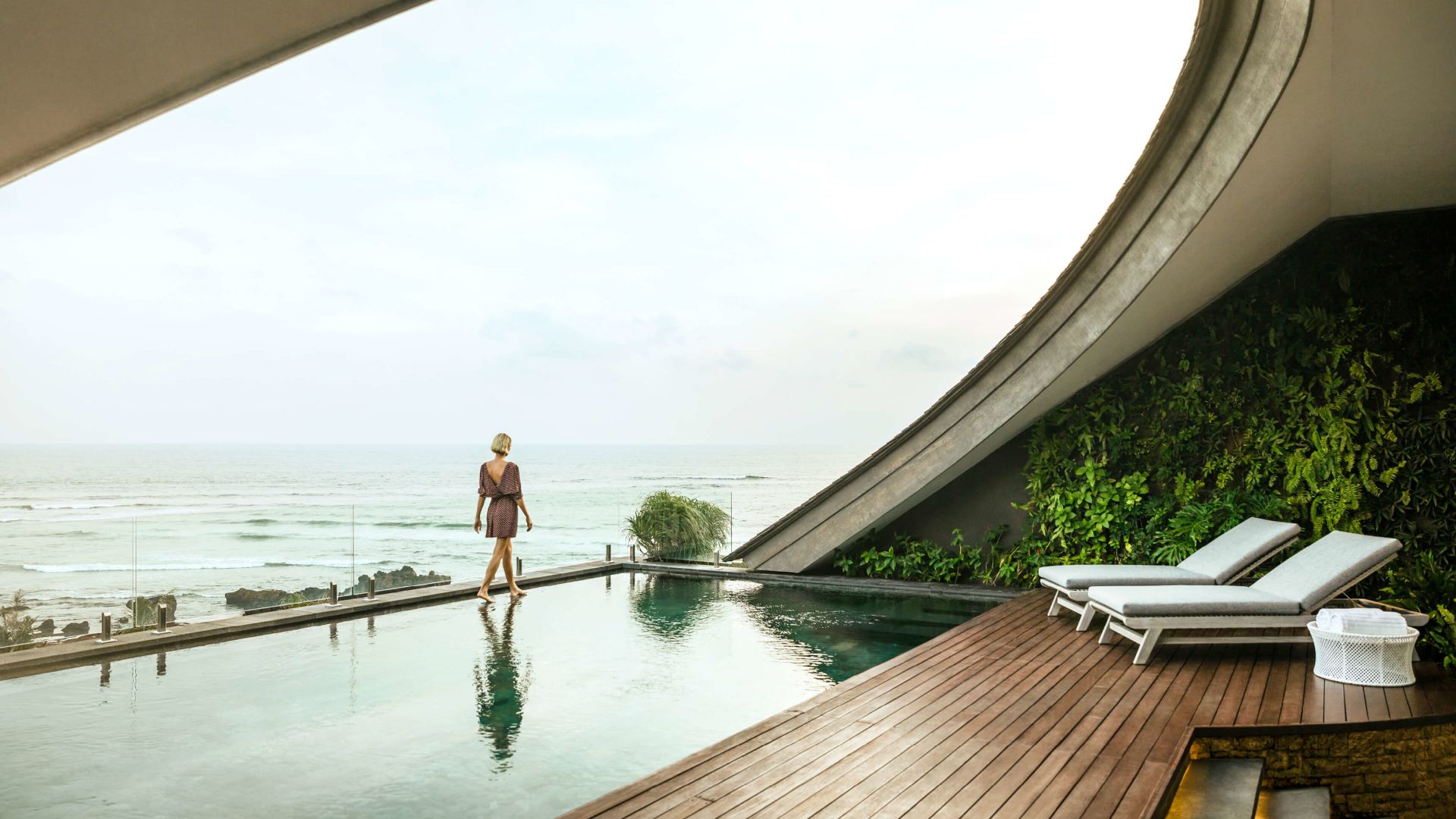 A Person Walking On A Dock