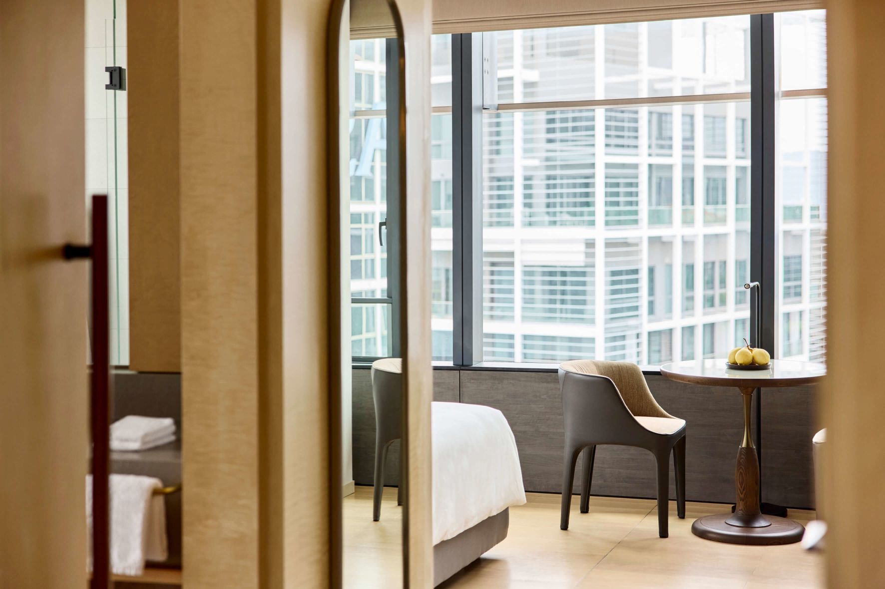 A Room With A Bed And Chairs