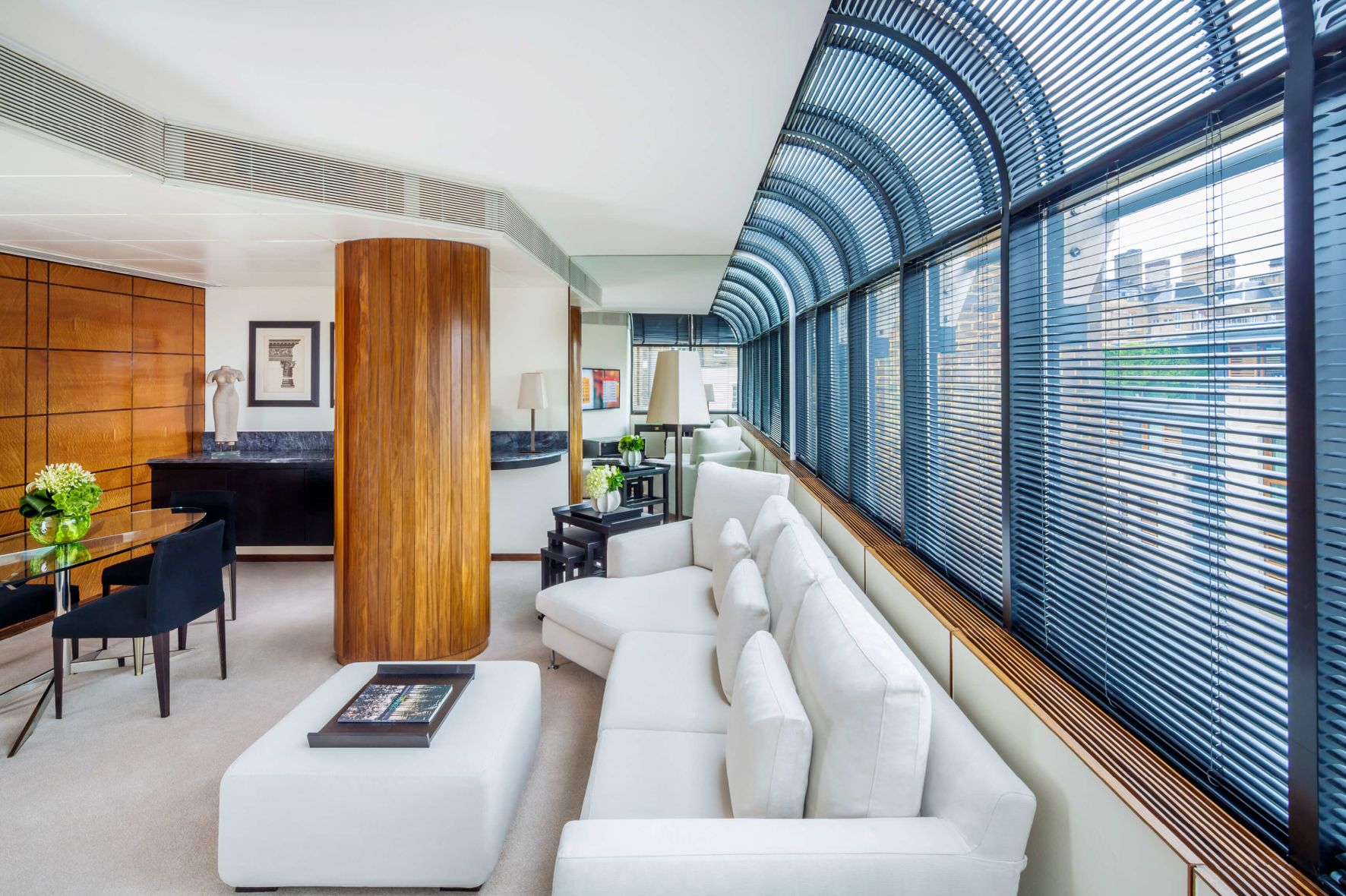 A Large Living Room With A Large Window