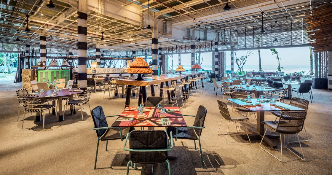 A Room With Tables And Chairs