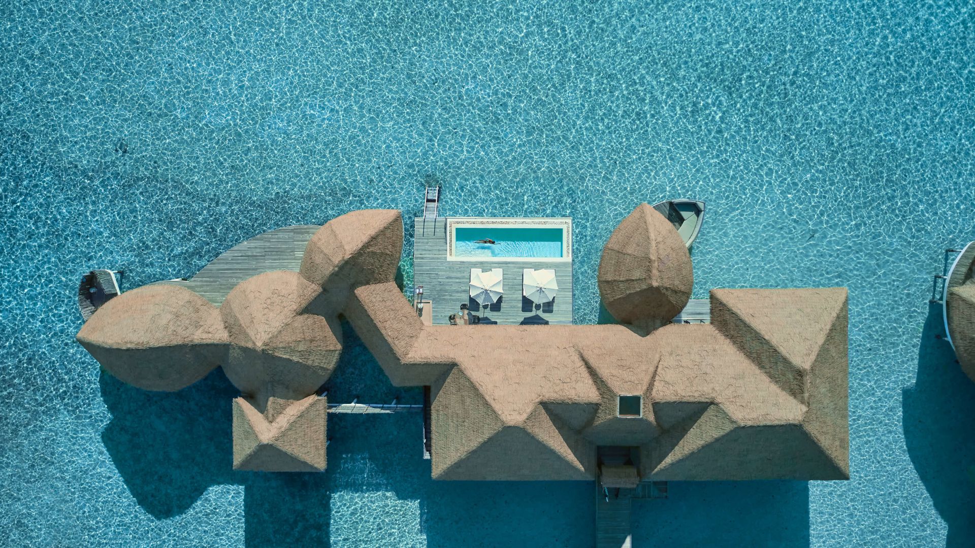 A Toy House With A Satellite Dish