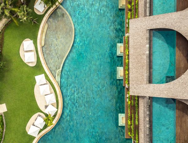 A Building With A Green Lawn