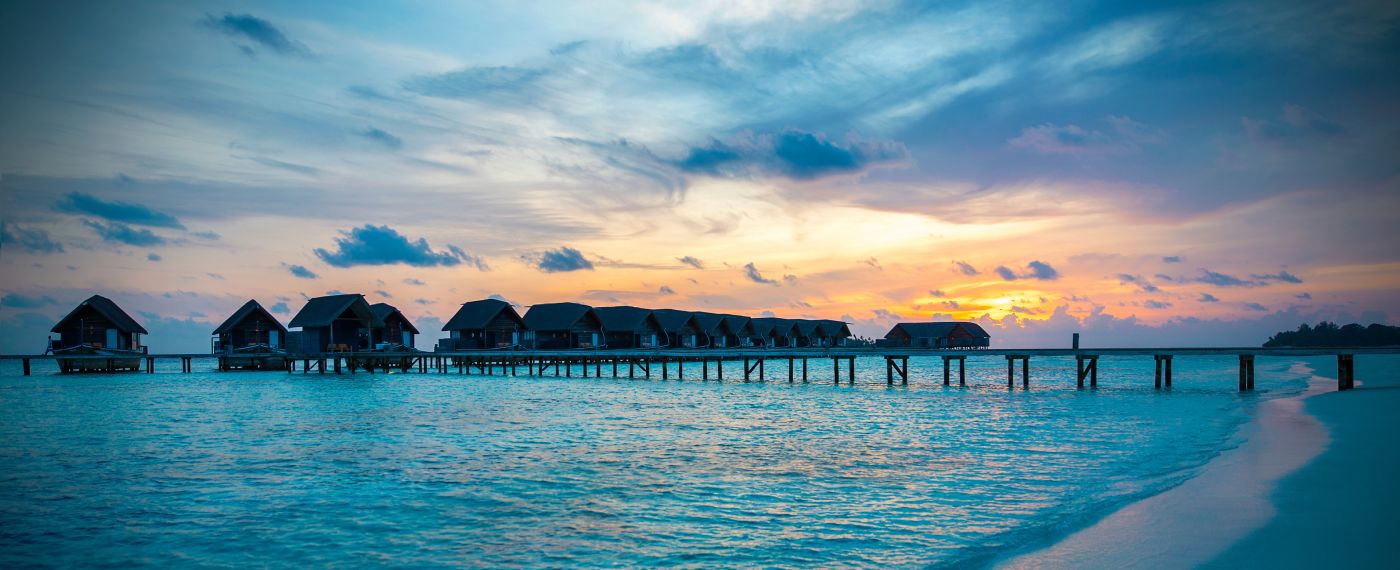 A Beach With Houses Along It