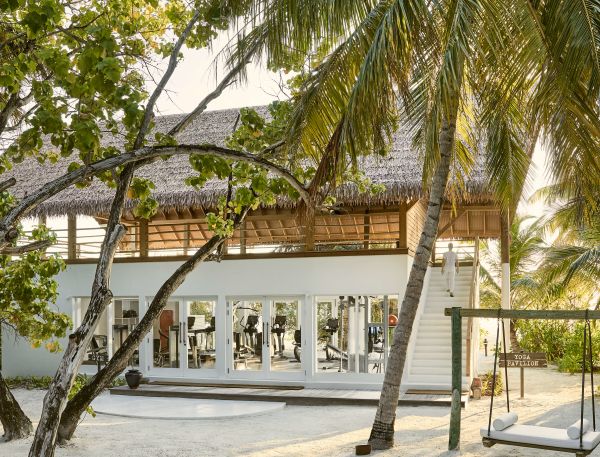 A Building With Trees Around It