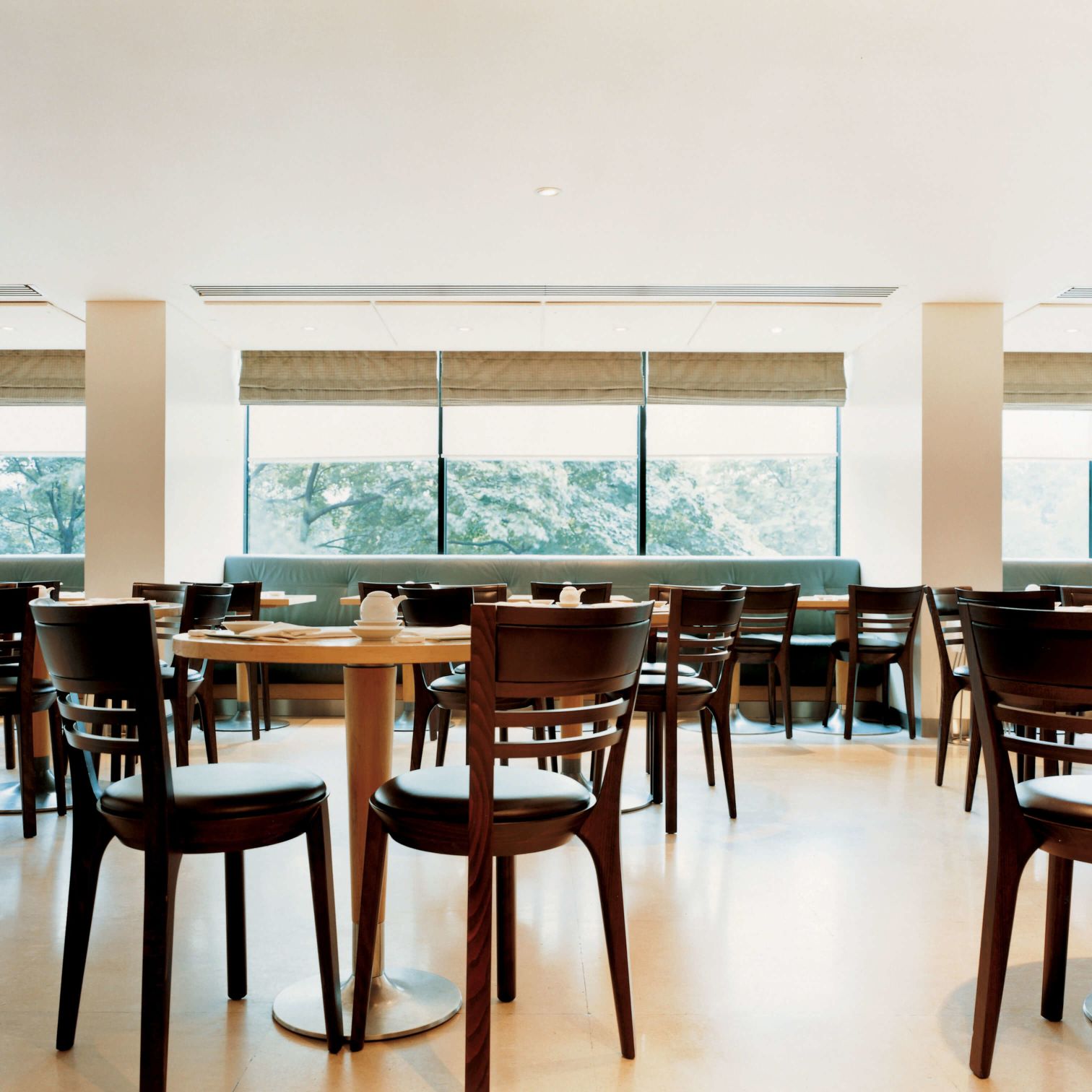 A Table With Chairs Around It