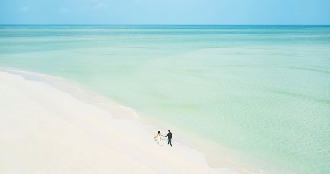 People Walking On A Snowy Hill
