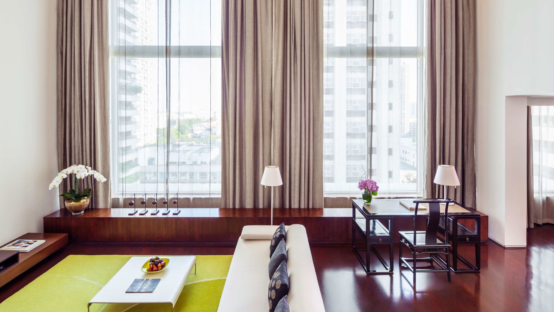 A Living Room With A Large Window