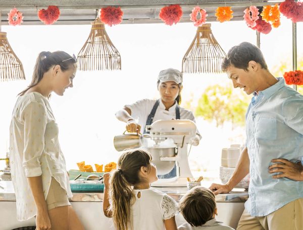A Group Of People Standing Outside
