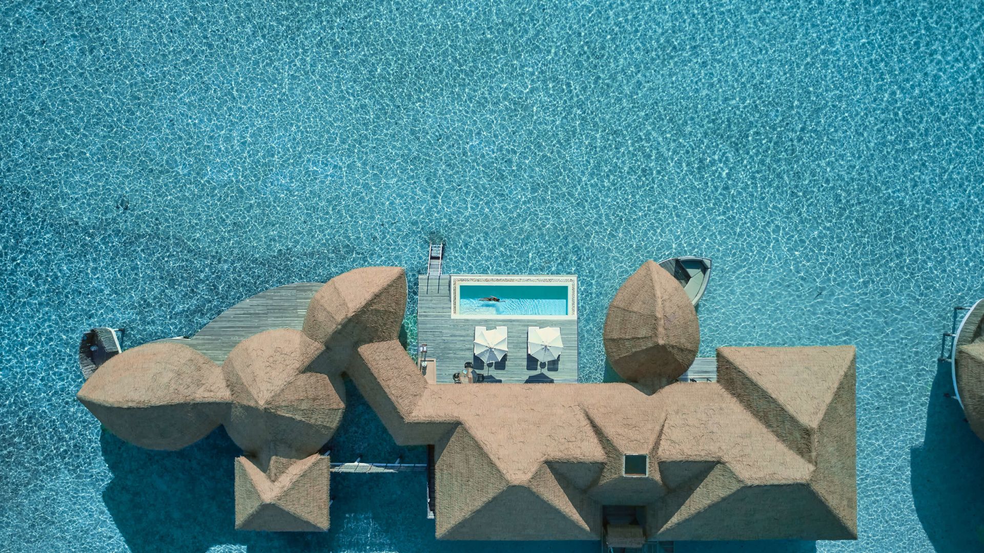 A Toy House With A Satellite Dish