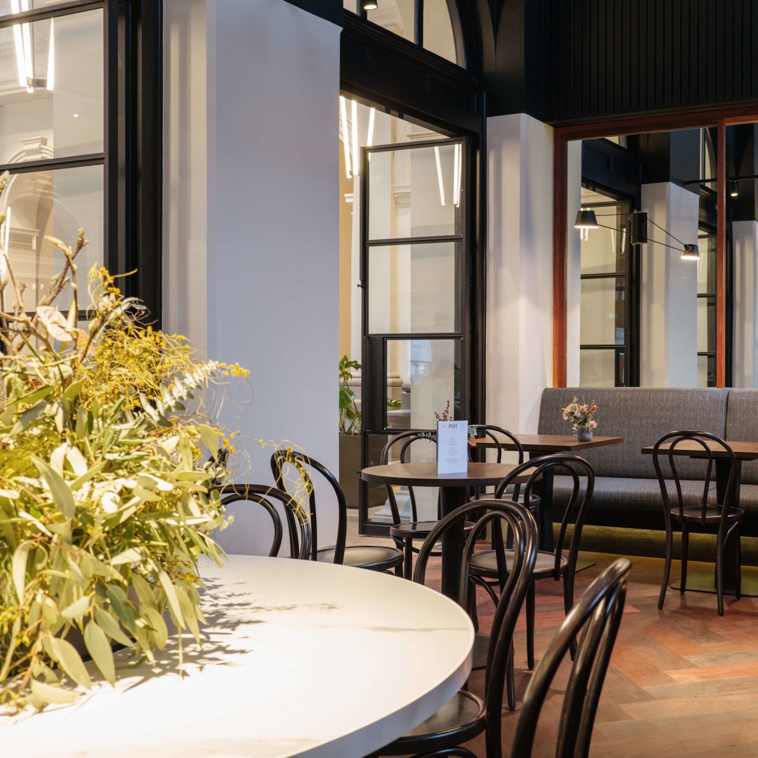 A Room With Tables And Chairs