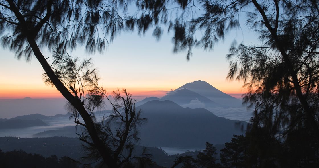 A Sunset Over A Mountain Range