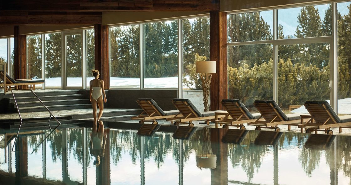 A Person Standing In A Swimming Pool