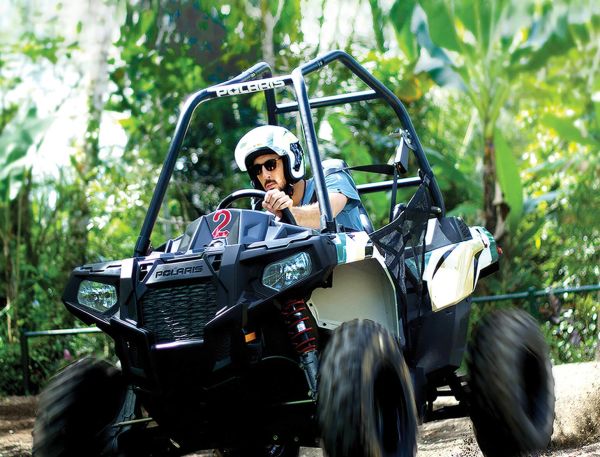 A Person Driving A Vehicle