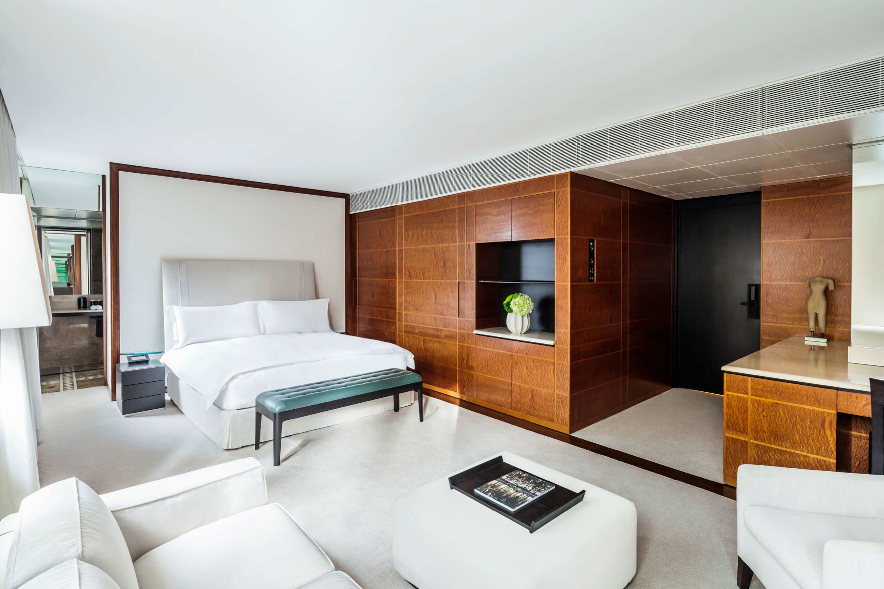 A Room With A Bed And Couches