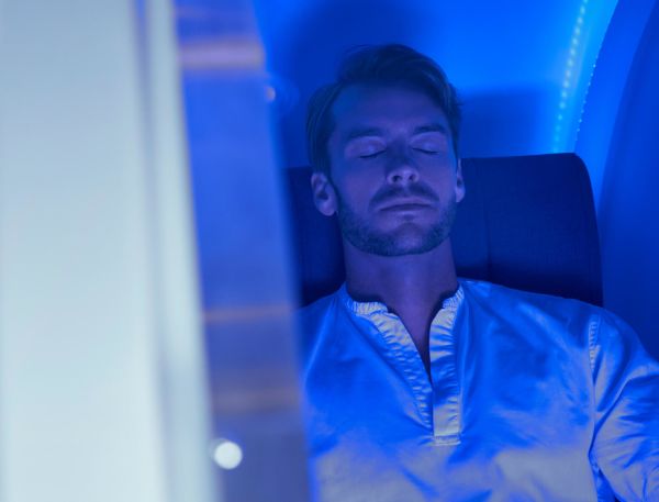 A Man Sitting In A Chair